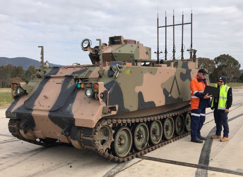 jeff berg acubis in front defence armoured tank
